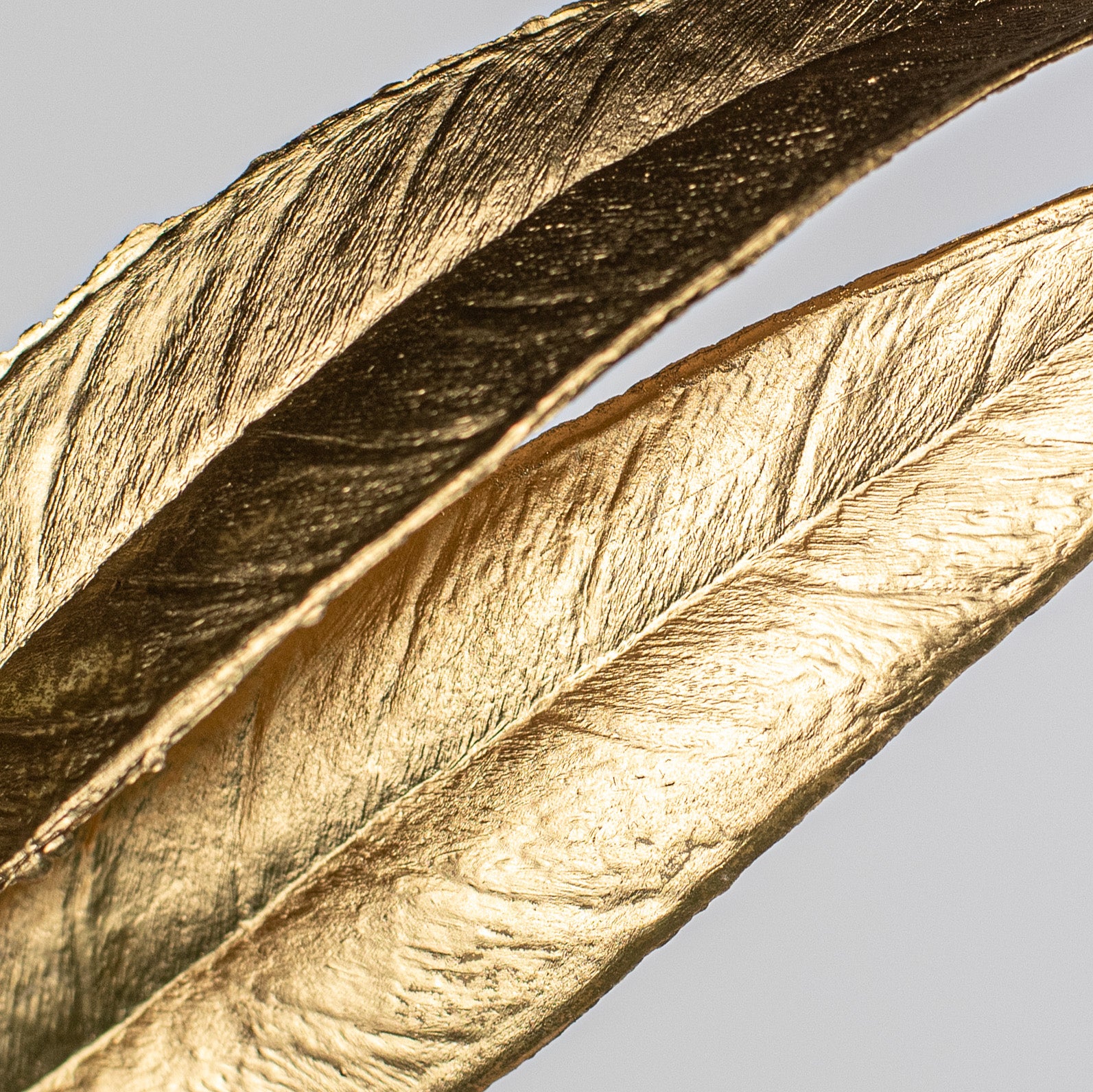 23" Metallic White Willow Leaf Spray: Gold